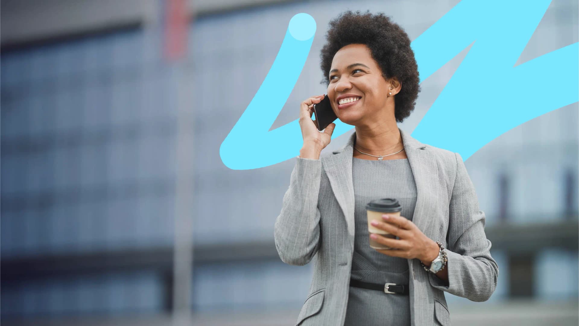 an image of a woman holding a phone